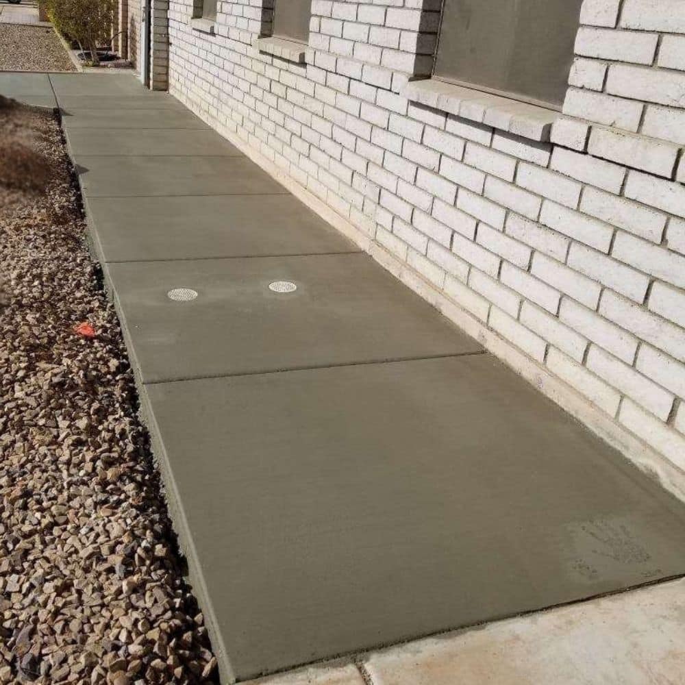 A concrete sidewalk poured by Ohana's Concrete Specialist